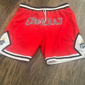 The G.O.A.T red men’s shorts/ size 3XL/ fits like a 2XL